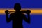 Power stripe through silhouette of baseball player holding bat