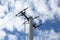 Power transmission masts against a blue sky