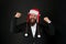 Power of xmas. Strong Santa flex arms. Bearded man in xmas style. Happy businessman in santa hat show strength. X-mas