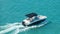 Powerboat or motorboat. Fishing boat on ocean waves. Ocean or Gulf of Mexico. Spring break or Summer vacations in Florida. Blue-tu