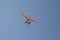 Powered hang glider, para glider. sail flying object on beautiful blue sky