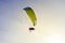 Powered parachute against the blue sky