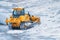 Powerful bulldozer for snow removal after snowfall