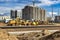 Powerful construction equipment for the construction of a new facility. Construction equipment for earthworks. Modern building