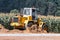 Powerful crawler bulldozer close-up at the construction site. Construction equipment for moving large volumes of soil. Modern