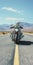 Powerful And Emotive Motorcycle Portrait On Desert Road