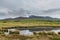 Powerful erupting Mount Aso with little pond in Kumamoto, Japan