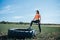 Powerful Fitness Woman Tackling Physical Exercises with Tire in Outdoor Session