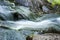 Powerful flow of water over the stones