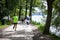 Powerful happy elderly people are walking, running in the park