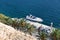 Powerful high-speed boat at the pier on the background of trees