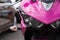 Powerful modern pink bright sport motorcycle, front view.