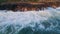 Powerful ocean surf crashing cliff aerial view. Marine swell splashing at coast