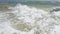 Powerful ocean waves crashing on a coast. Extreme stormy ocean waves splashing on a Beach