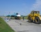Powerful Russian military jet fighter plane on the runway of the SU-34 tractor carries engine