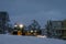 Powerful snowplough clearing parking lot