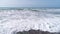 Powerful stormy sea waves, Crashing wave line in the mediterranean sea with foamy white texture