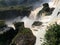 A powerful stream of river rushing into the abyss in the Iguazu national Park in Argentina, South America