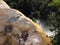 A powerful stream of river rushing into the abyss in the Iguazu national Park in Argentina, South America