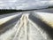 Powerful traces of a jet on the water from a moving boat along the river