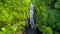 Powerful Tropical Waterfall in Green Rainforest.