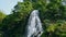 Powerful waterfall rushing jungles drone view. Amazing vivid nature scenery.