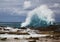 Powerful Wave and surf hit rocky coast