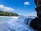 Powerful waves flow over rocks at Lumahai Beach, Kauai