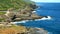 Powerful waves of ocean hitting cliff Lanai Lookout East Oahu, Hawaii