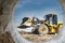 Powerful wheel loader or bulldozer working on a quarry or construction site. Earthworks in construction. Powerful modern equipment