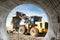 Powerful wheel loader or bulldozer working on a quarry or construction site. Earthworks in construction. Powerful modern equipment