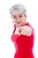 Powerful woman in red isolated with gray hair pointing with finger