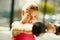 Powering through the pain. an attractive young woman working out with dumbbells.