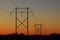 Powerline`s silhouettes at Sunset out in the country in Kansas.