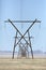 Powerlines in Namibian desert. In a line.