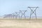 Powerlines stretching to the horizon in Namibia.