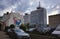 Poznan, Poland: Cars parked in a Parking lot against modern architecture of hotel desilva and piekary building