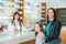 Ppharmacist giving vitamins to child girl in pharmacy drugstore