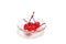 Ppreserving in syrup cherries in a glass bowl isolated on a white background.