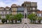 Praca de Carlos Alberto square with ornate cobblestone leading to the Monument to the Dead of Great War Porto, Portugal