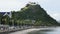 Prachuap bay beach and Wat Khao Chong Krachok in Prachuap Khiri Khan, Thailand