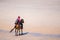 Prachuap Khiri Khan, Thailand- April, 03, 2021 : Unidentified name People horseback riding at Hua hin beach on hot sun during the