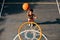 Practice like youve never won, play like youre never lost. High angle shot of a sporty young woman throwing a basketball