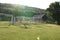 Practice portable football or soccer goals neatly arranged and lying near a football playground