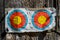 Practice target used for shooting with bullet holes in it, toned