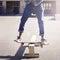 Practicing some cool tricks. a young man doing a skateboarding trick.