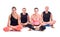 Practicing Yoga exercises in group / Scale Pose - Tolasana