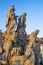 Prague - The baroque statues of John of Matha, Felix of Valois and Saint Ivan on the  Charles Bridge by Ferdinand Brokoff