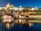 Prague Castle, Czech: Prazsky hrad. Illuminated landmark by night. Vew from Charles Bridge, Praha, Czech Republic