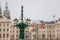 Prague Castle from Hradcany Square, Main entrance to the courtyard, green street lanterns looks like candelabra, snow in winter